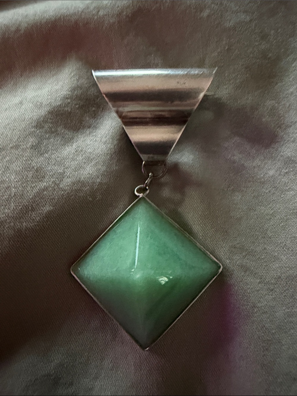 Green jade pyramid brooch